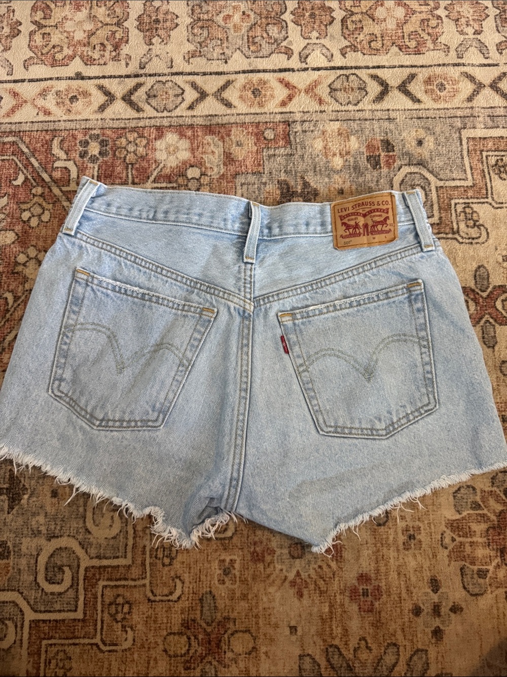 Levi's Light Blue Distressed Denim Cutoff Shorts - Picture 2 of 4